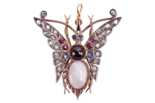 A Victorian opal, garnet, diamond, ruby and sapphire set butterfly pendant. The oval cabochon opal