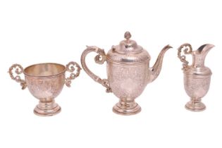 A Victorian silver bachelor's coffee set, with dragon handles, London 1890, by John Aldwinckle &