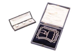 A Victorian buckle and a set of dress studs; the buckle designed as a continuous ribbon set with