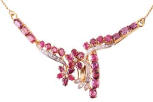 A ruby and diamond necklace; the centre set with foliate sprays of round brilliant cut diamonds