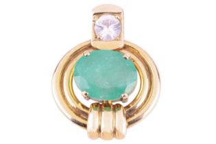 An emerald and white sapphire pendant; set with a central oval-cut emerald in claw mount,