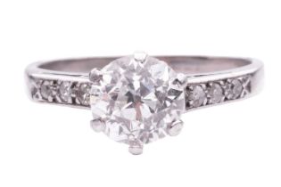 A diamond solitaire ring, claw-set with an old-cut diamond of 6.4 mm, with an estimated weight of