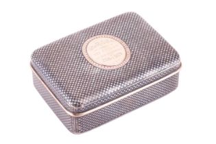 A late 19th-century Continental Niello snuff box, rectangular form with rounded corners, worked