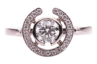 A diamond halo ring, collet-set with a round brilliant-cut diamond of 0.50ct, encircled with a frame