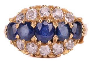 A sapphire and diamond dress ring, designed as a graduated row of sapphires between rows of old