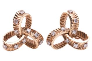 A pair of diamond-set knot earrings, with ridged texture and embellished with single-cut diamonds,