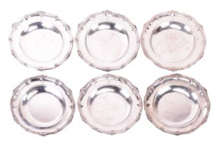 A set of six silver soup plates, by Robert Garrard II, London 1829, bearing the regimental badge for