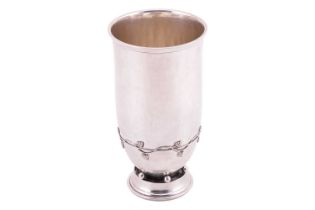 A silver cup by Peter Hertz, Copenhagen 1929, of baluster form with flared rim, body encircled