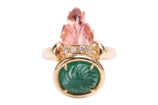 An emerald, tourmaline and diamond dress ring, featuring an oval carved emerald within a collet