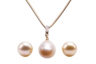 A pair of South Sea cultured pearl stud earrings and a matching pendant on chain; the earrings