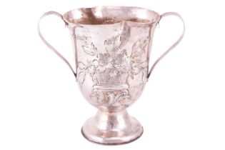 A George III silver loving cup, London 1788, maker's mark 'W.S', of bell shaped form to a circular