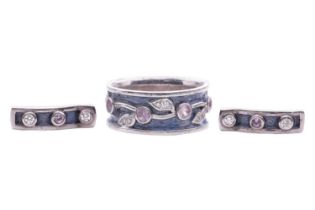 A gem-set enamel ring and matching earrings in 18ct white gold, by jewellers Peter and Sandra Noble;