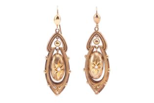 A pair of Victorian drop earrings, each designed as a drop shape with a central oval domed pendant