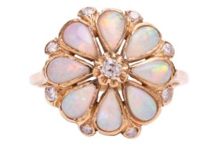 An opal and diamond floral cluster ring, comprising eight pear-shaped precious opal cabochons