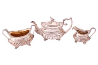 A George III silver three-piece tea service, by John Watson & Son, Sheffield 1816, comprising a
