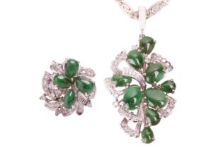 A cabochon emerald and diamond-set cluster pendant and matching ring, of tiered foliate design,