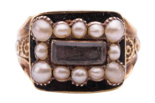 An early Victorian mourning ring set with split pearls and enamel, the curved rectangular panel