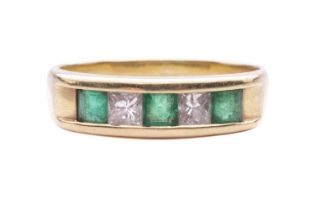 An emerald and diamond half-hoop ring, channel-set with three square table-cut emeralds and