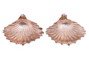 A pair of Victorian silver scallop shell dishes, London by Jackson & Deere, with scroll handles