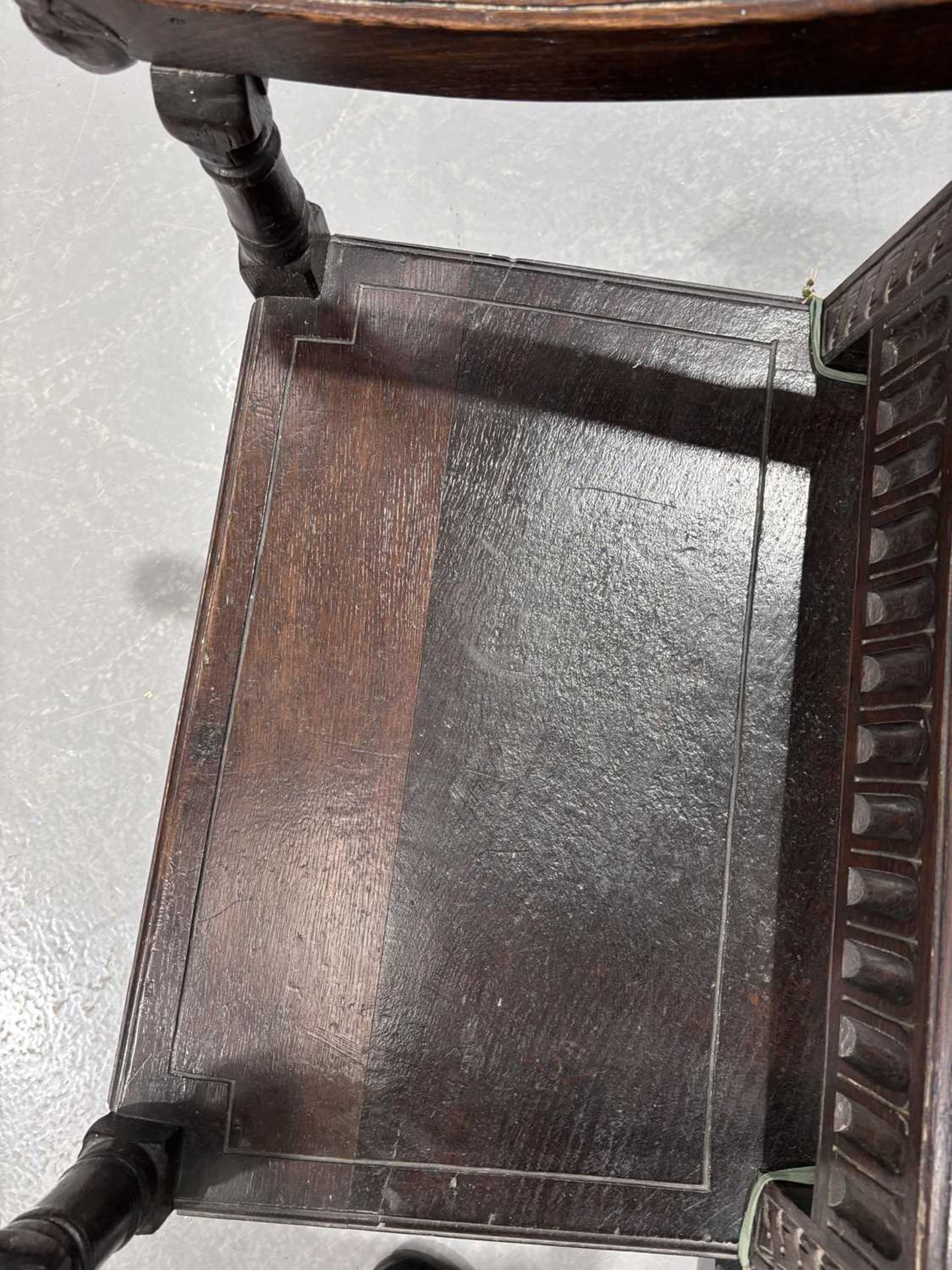 An oak wainscot armchair, 17th century and later, with carved decoration, the arms terminating in ca - Bild 16 aus 26