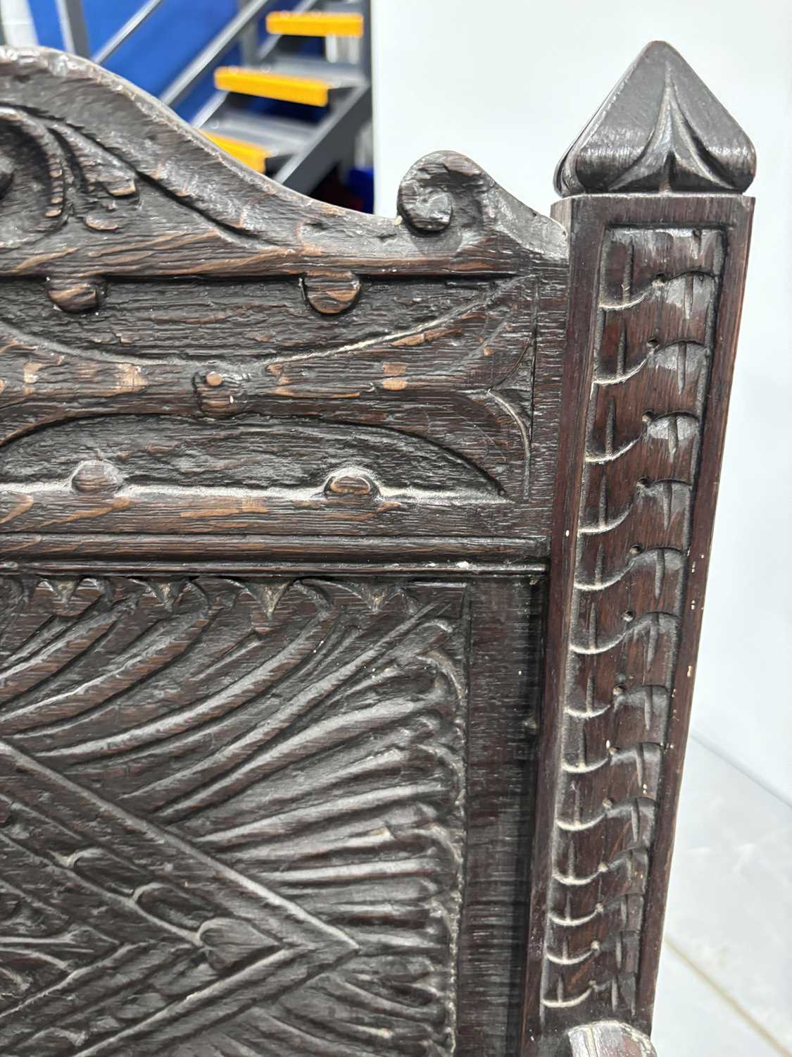 An oak wainscot armchair, 17th century and later, with carved decoration, the arms terminating in ca - Image 18 of 26