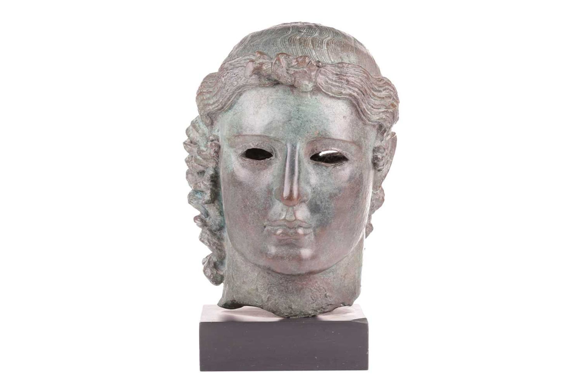 A Grand Tour style patinated bronze, cast after the Chatsworth Apollo Head, raised on a rectangular  - Bild 2 aus 7