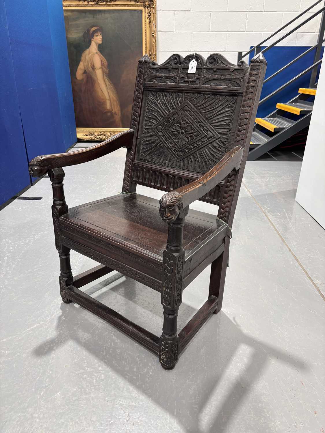 An oak wainscot armchair, 17th century and later, with carved decoration, the arms terminating in ca - Image 7 of 26