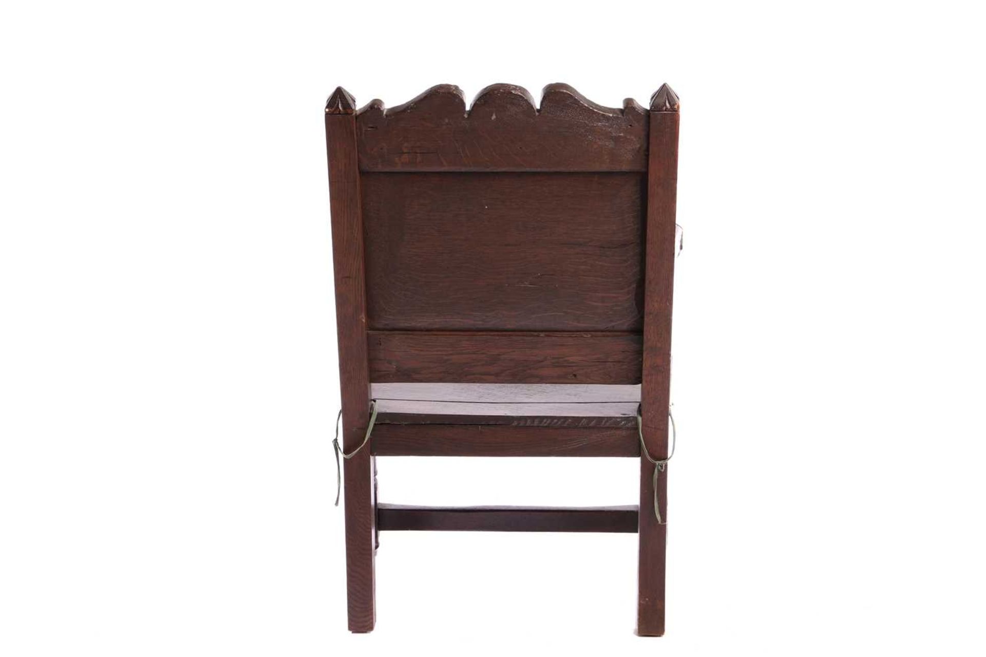 An oak wainscot armchair, 17th century and later, with carved decoration, the arms terminating in ca - Bild 4 aus 26