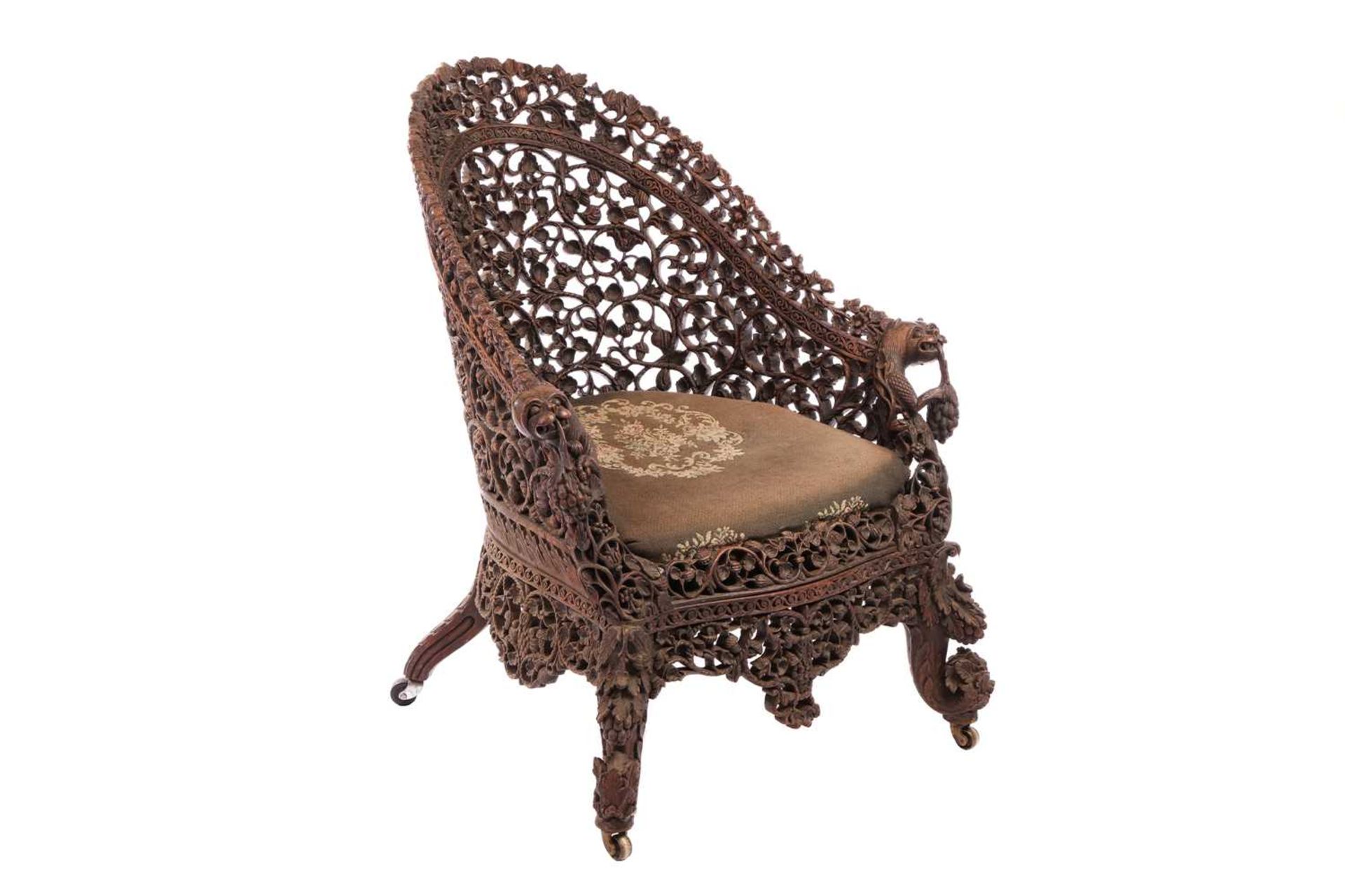 A Bombay Presidency carved rosewood arched back armchair, C1860s profusely carved with Indian strawb - Bild 2 aus 16