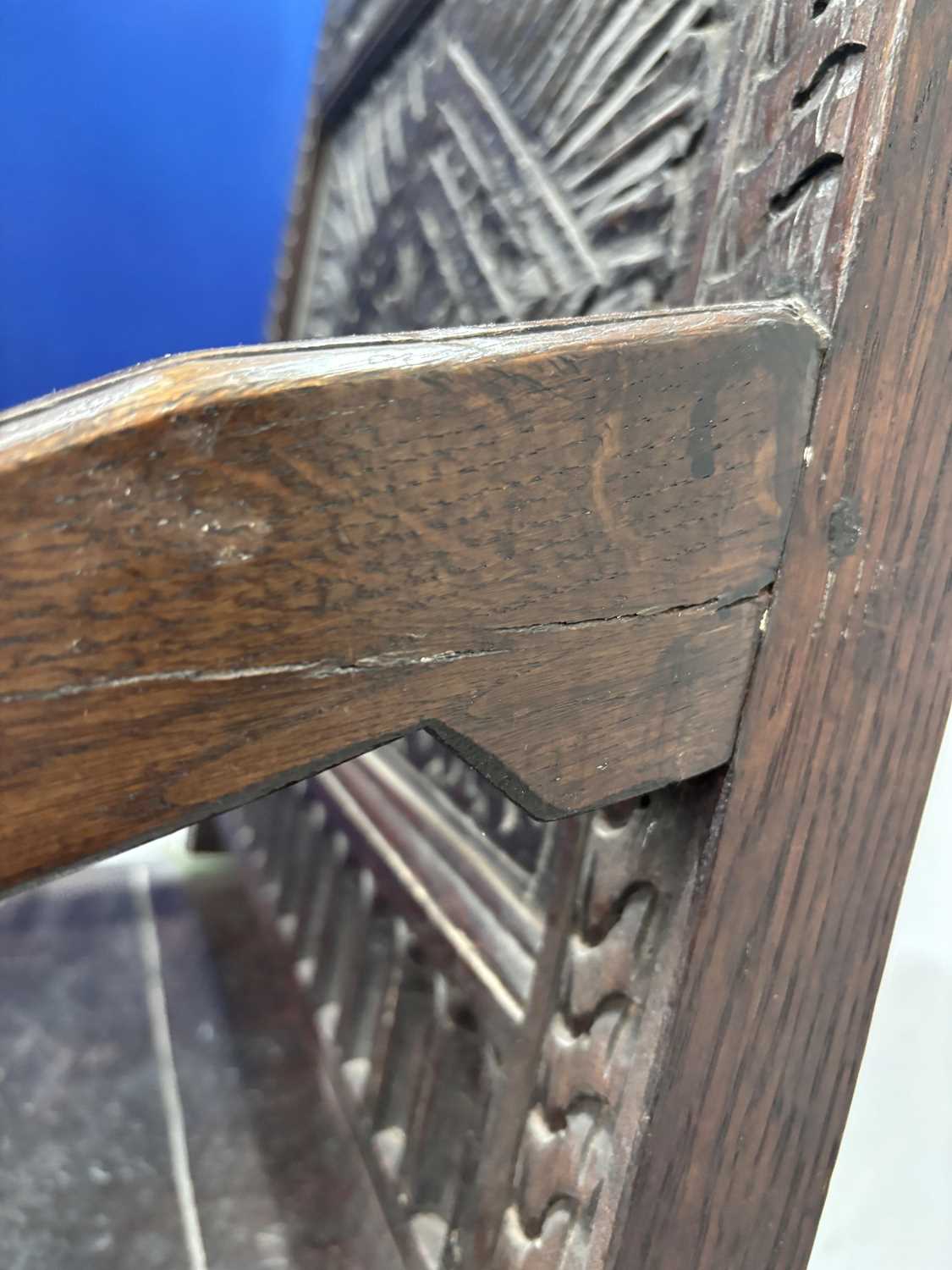 An oak wainscot armchair, 17th century and later, with carved decoration, the arms terminating in ca - Image 9 of 26