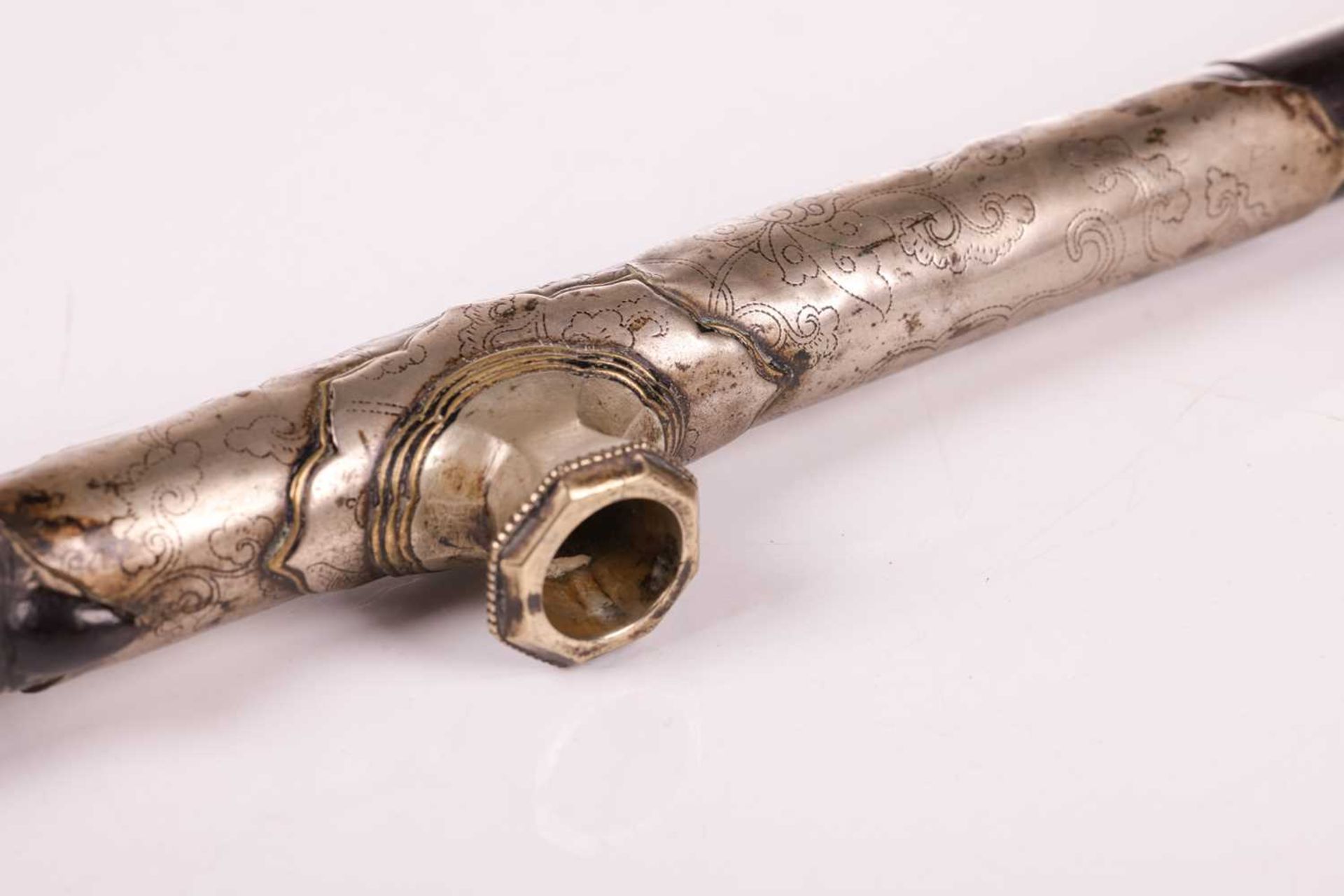 A 19th/20th-century Chinese zitan wood opium pipe with a white jade mouthpiece, paktong saddle and b - Image 8 of 10