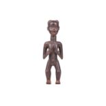 A Dan carved wood fertility standing figure, 20th century, 42 cm high.