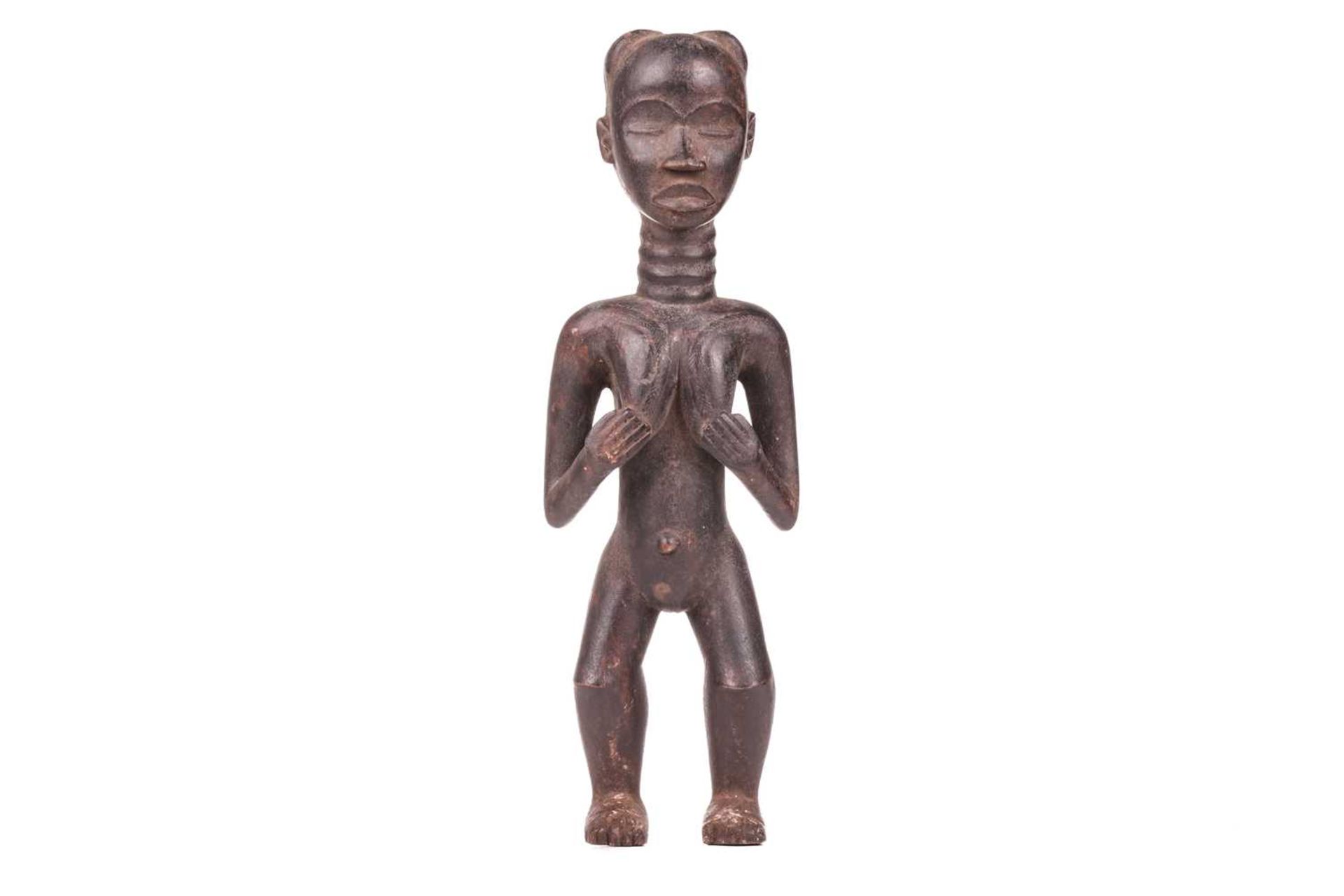 A Dan carved wood fertility standing figure, 20th century, 42 cm high.