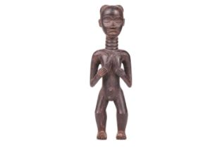 A Dan carved wood fertility standing figure, 20th century, 42 cm high.