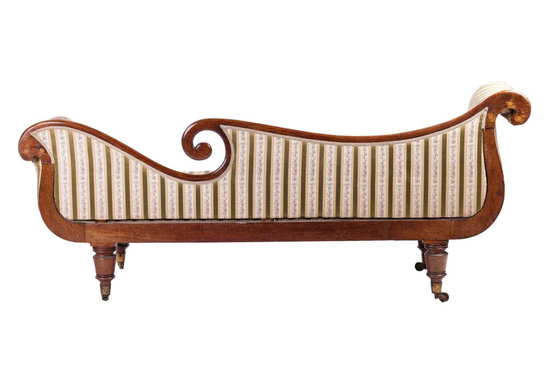In the manner of John McLean a Regency brass inlaid rosewood double scroll chaise longue, with spent - Image 3 of 11