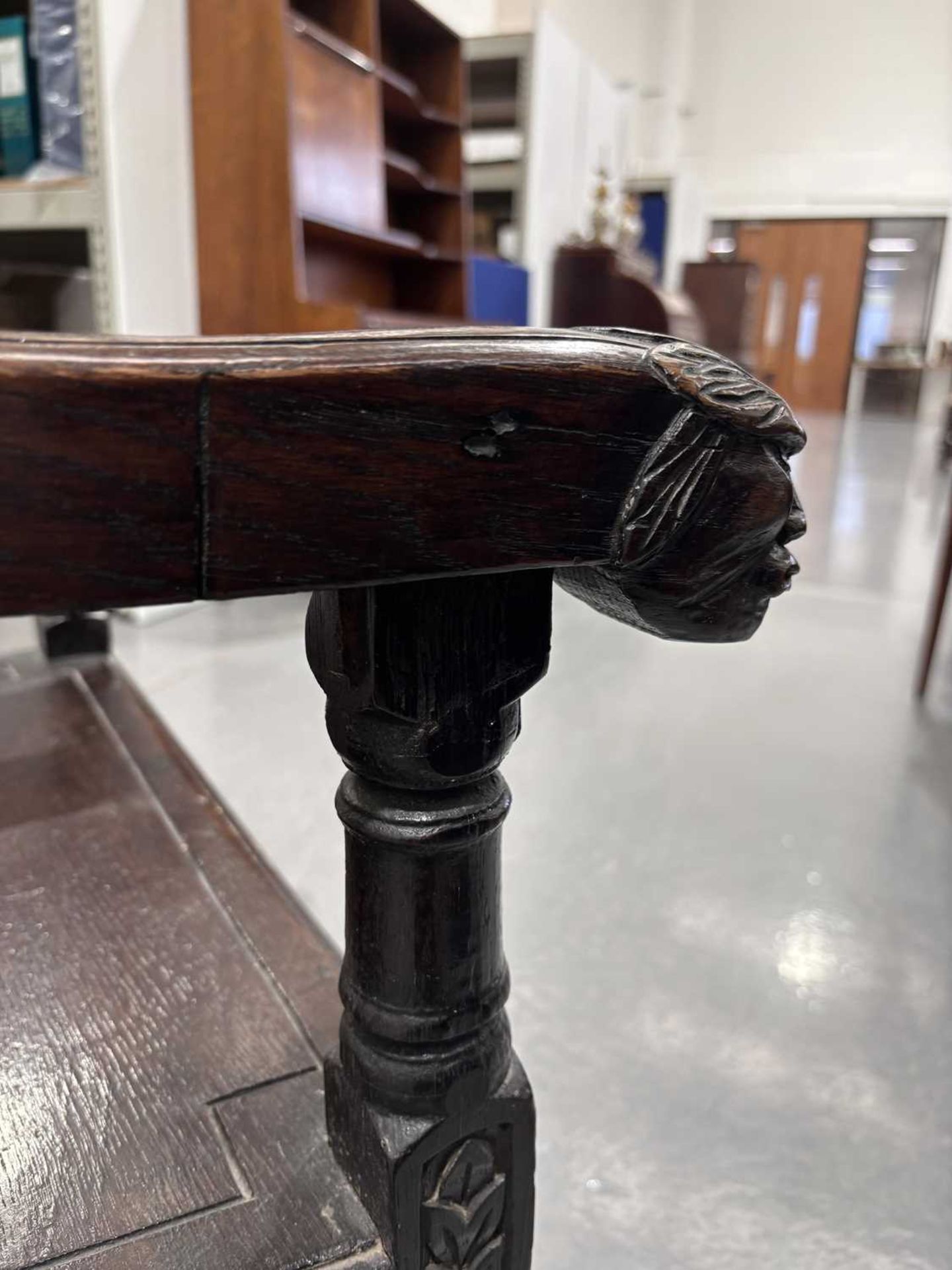 An oak wainscot armchair, 17th century and later, with carved decoration, the arms terminating in ca - Image 14 of 26