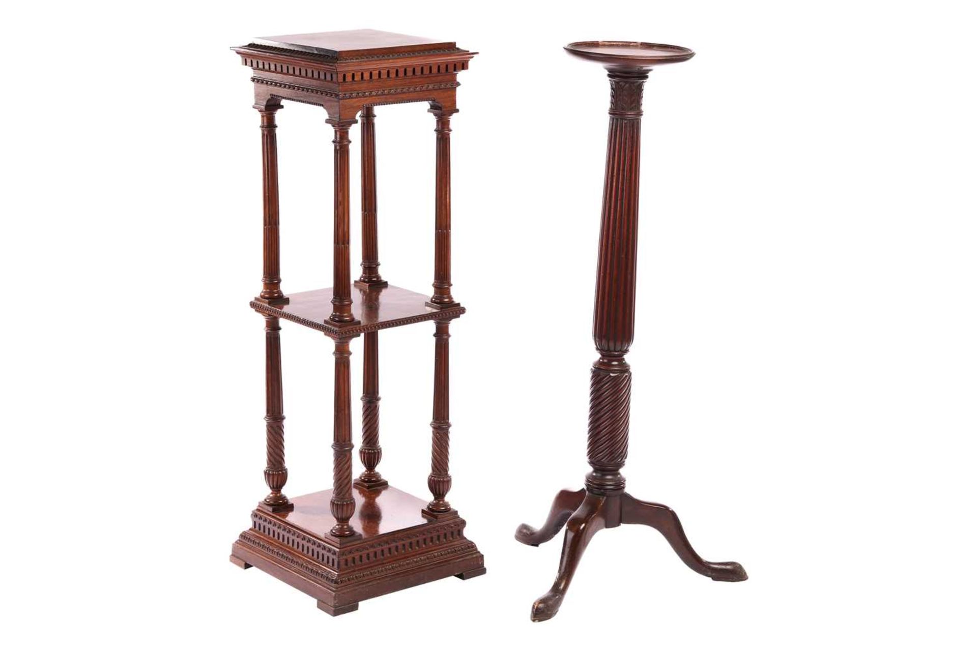 An Edwardian mahogany two-tier pedestal of architectural, form with dentil moulding and fluted colum