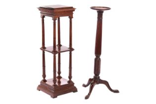 An Edwardian mahogany two-tier pedestal of architectural, form with dentil moulding and fluted