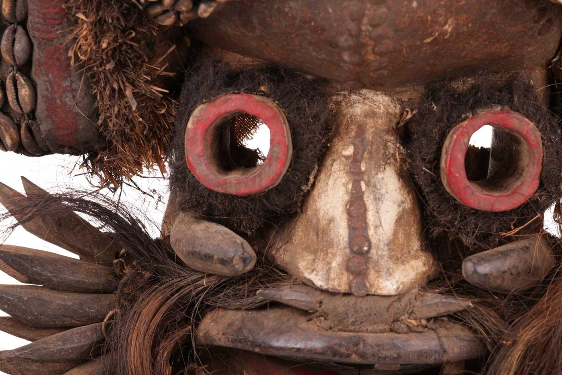 A large Ivory Coast Guerre warrior mask, painted in colours with shell decoration, 20th century, 48  - Image 5 of 8