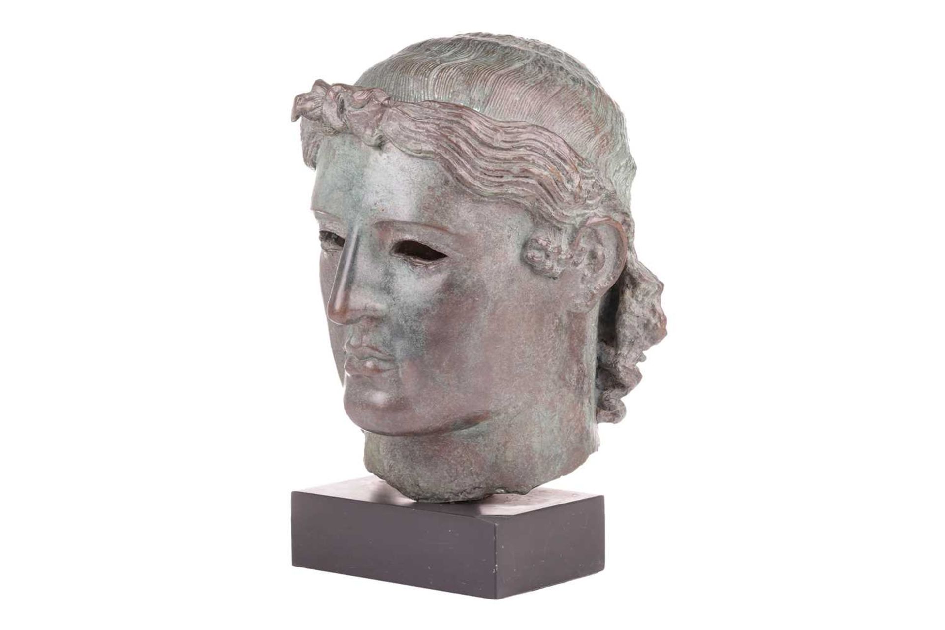 A Grand Tour style patinated bronze, cast after the Chatsworth Apollo Head, raised on a rectangular  - Image 3 of 7