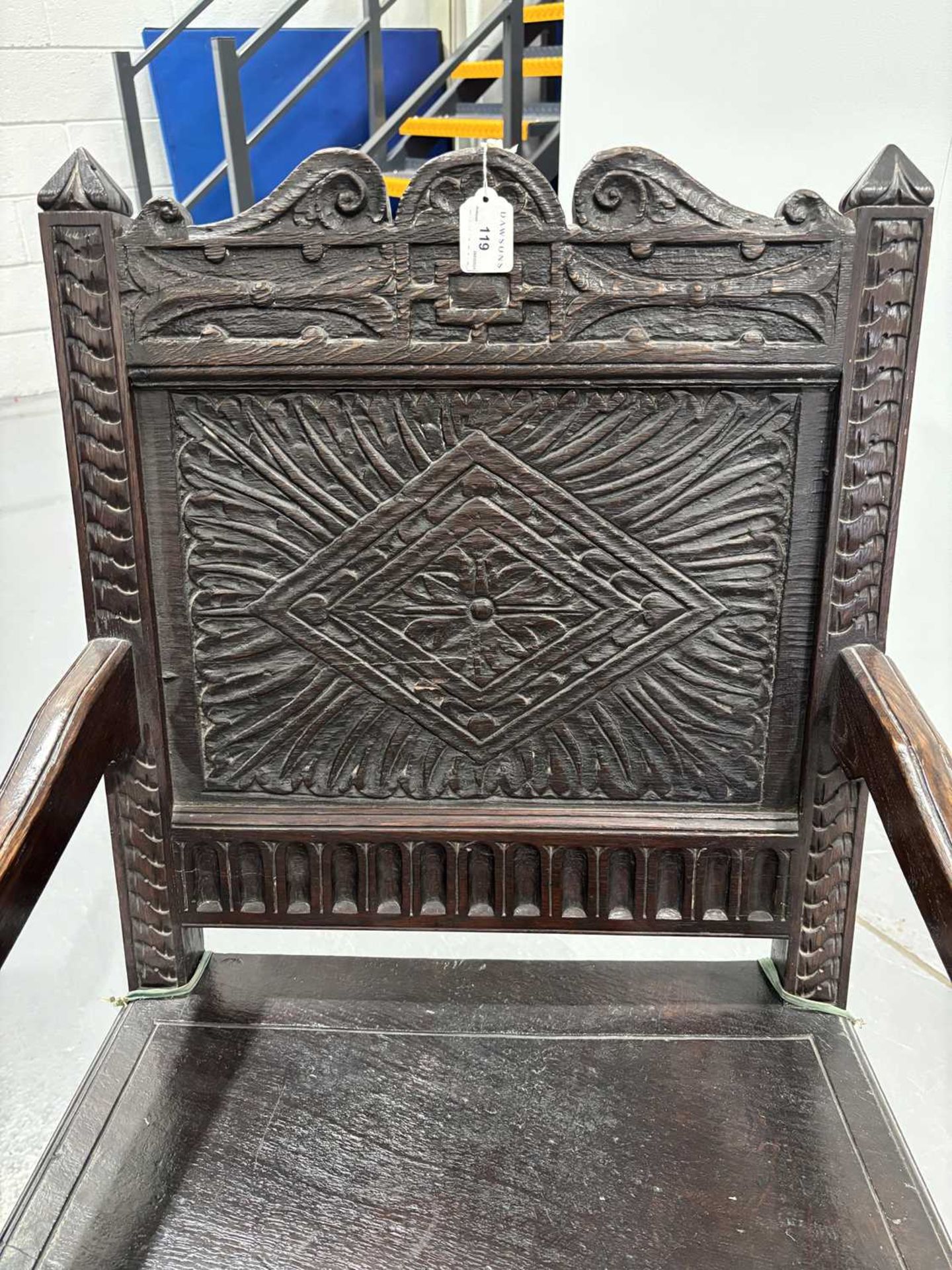 An oak wainscot armchair, 17th century and later, with carved decoration, the arms terminating in ca - Image 11 of 26