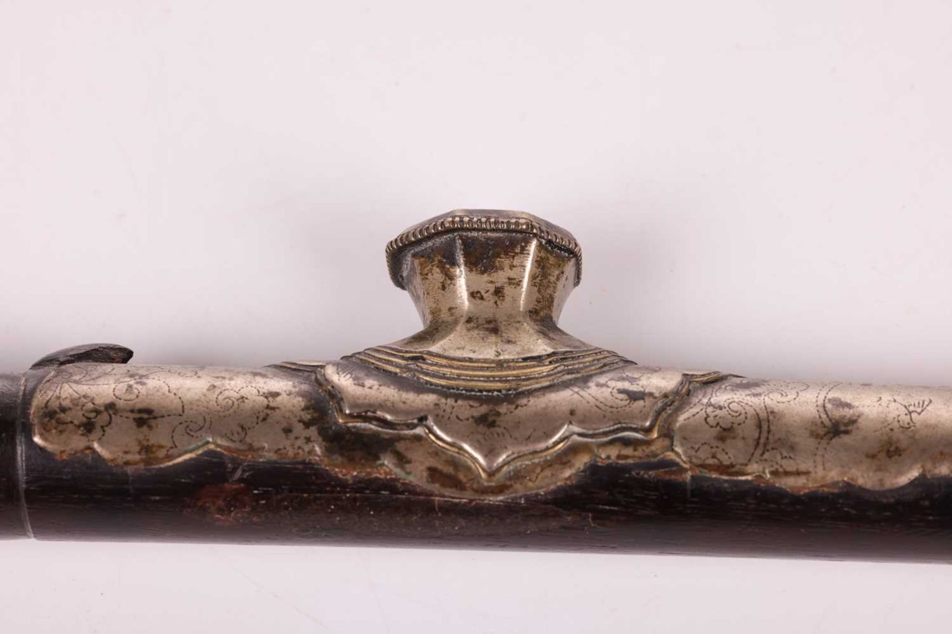 A 19th/20th-century Chinese zitan wood opium pipe with a white jade mouthpiece, paktong saddle and b - Image 5 of 10