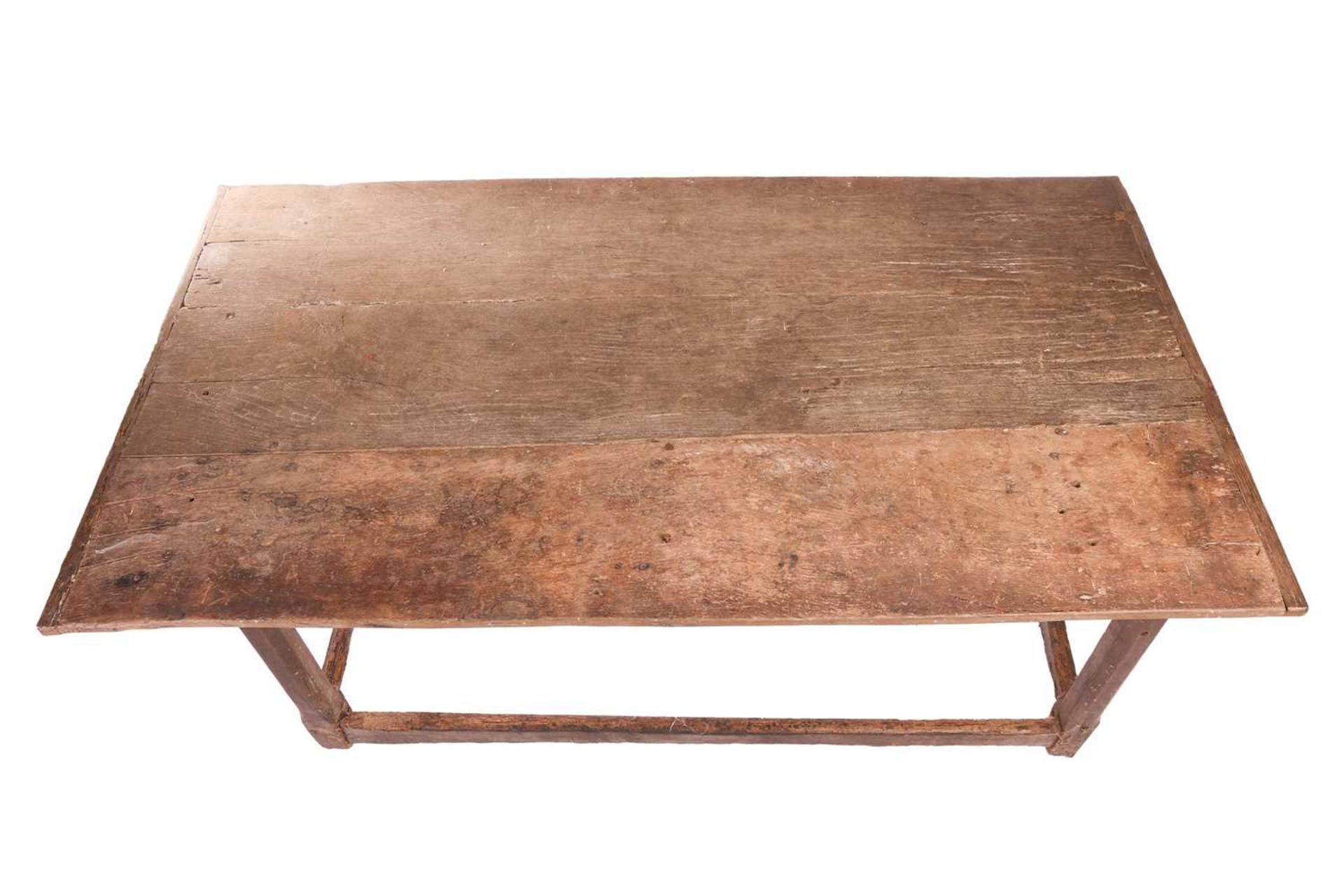 A rustic oak rectangular tavern table, 17th/18th century and later repairs, with a broad planked and - Bild 2 aus 6