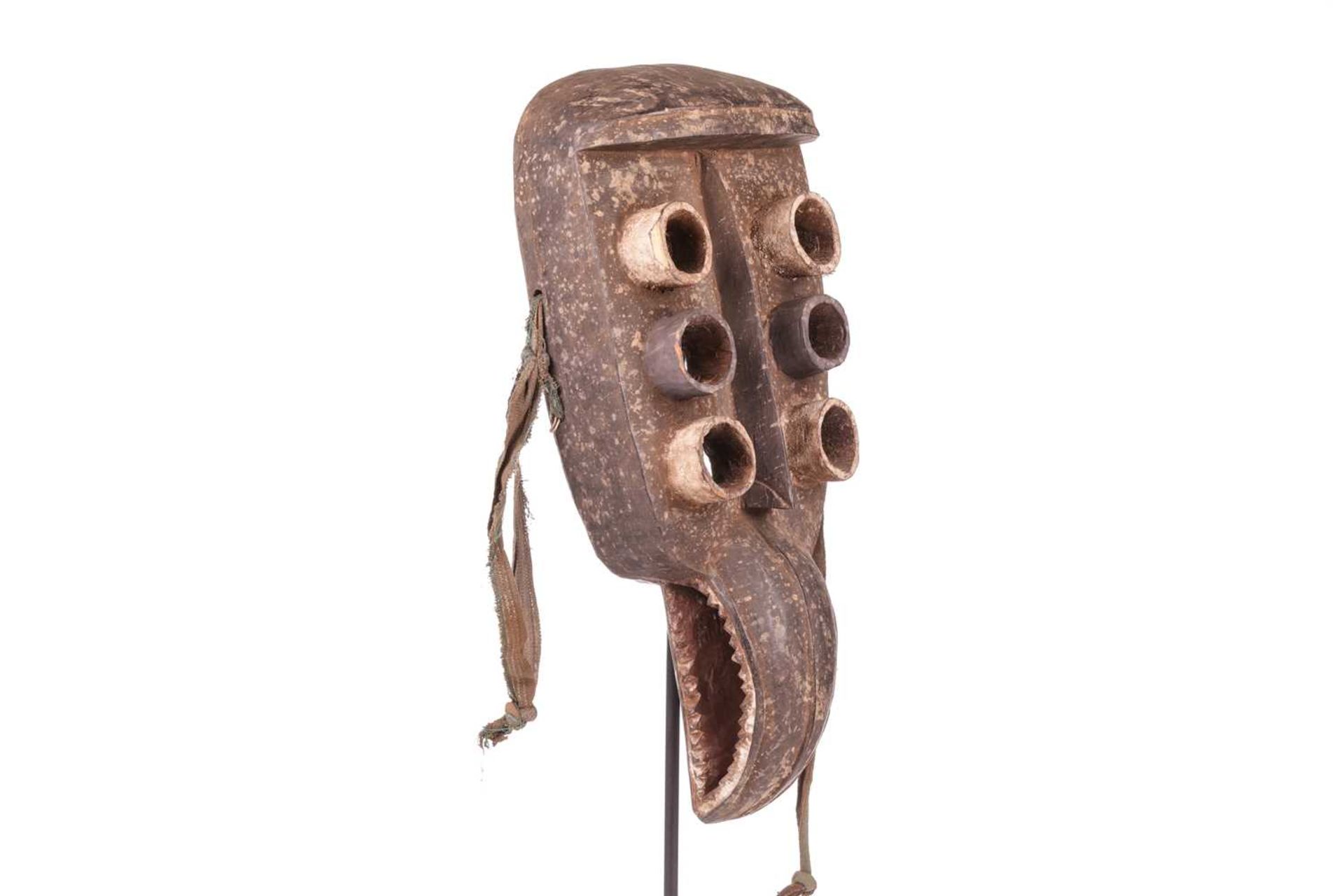 A Grebo ‘Kru’ mask, mid-20th century, 44 cm x 21 cm. NB: Display stand is for illustrative purposes  - Image 7 of 7