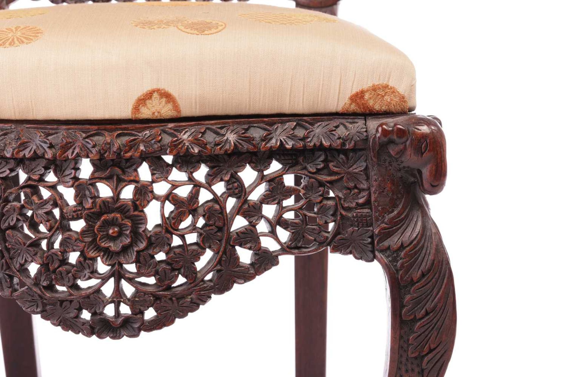 An Indian 'Bombay Carved' padauk slipper chair 19th century, the arched back pierced and carved with - Image 8 of 13