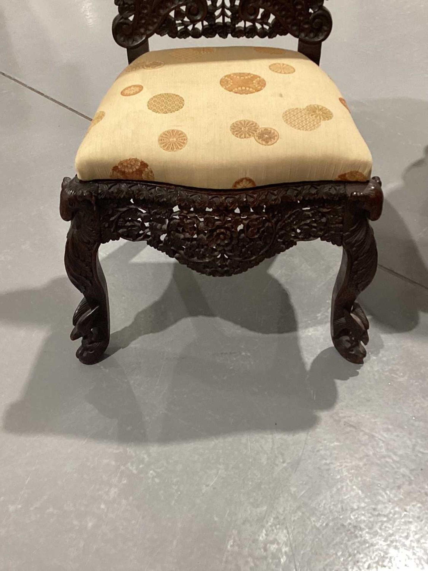 An Indian 'Bombay Carved' padauk slipper chair 19th century, the arched back pierced and carved with - Image 13 of 13