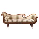 In the manner of John McLean a Regency brass inlaid rosewood double scroll chaise longue, with spent