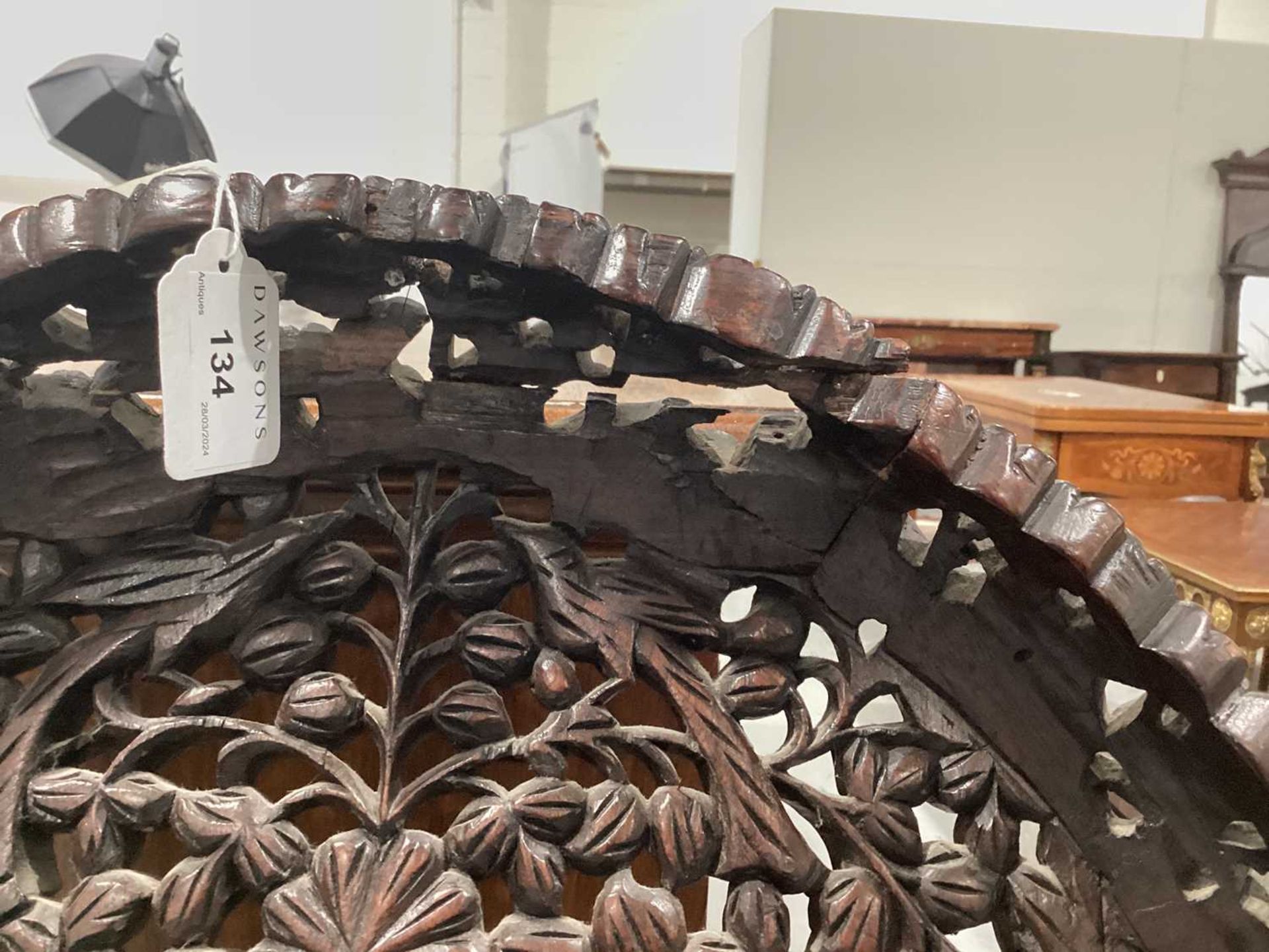 An Indian 'Bombay Carved' padauk slipper chair 19th century, the arched back pierced and carved with - Image 10 of 13