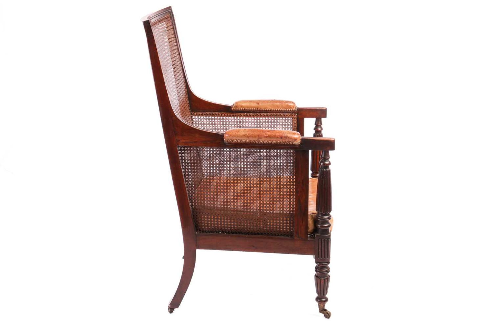 A William IV mahogany bergere library armchair, in the manner of Gillow of Lancaster with square spl - Bild 7 aus 18