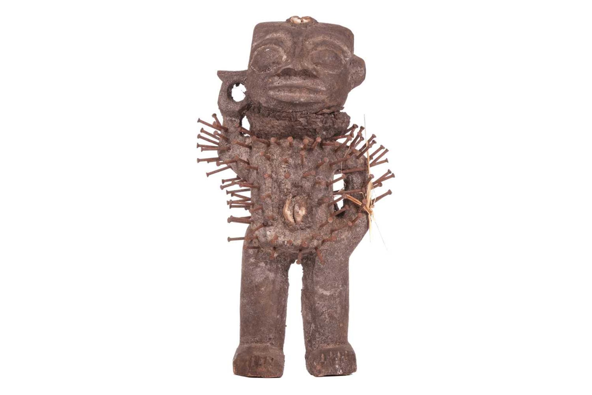 A small Bakongo nail fetish standing figure, 20th century, 22 cm high.